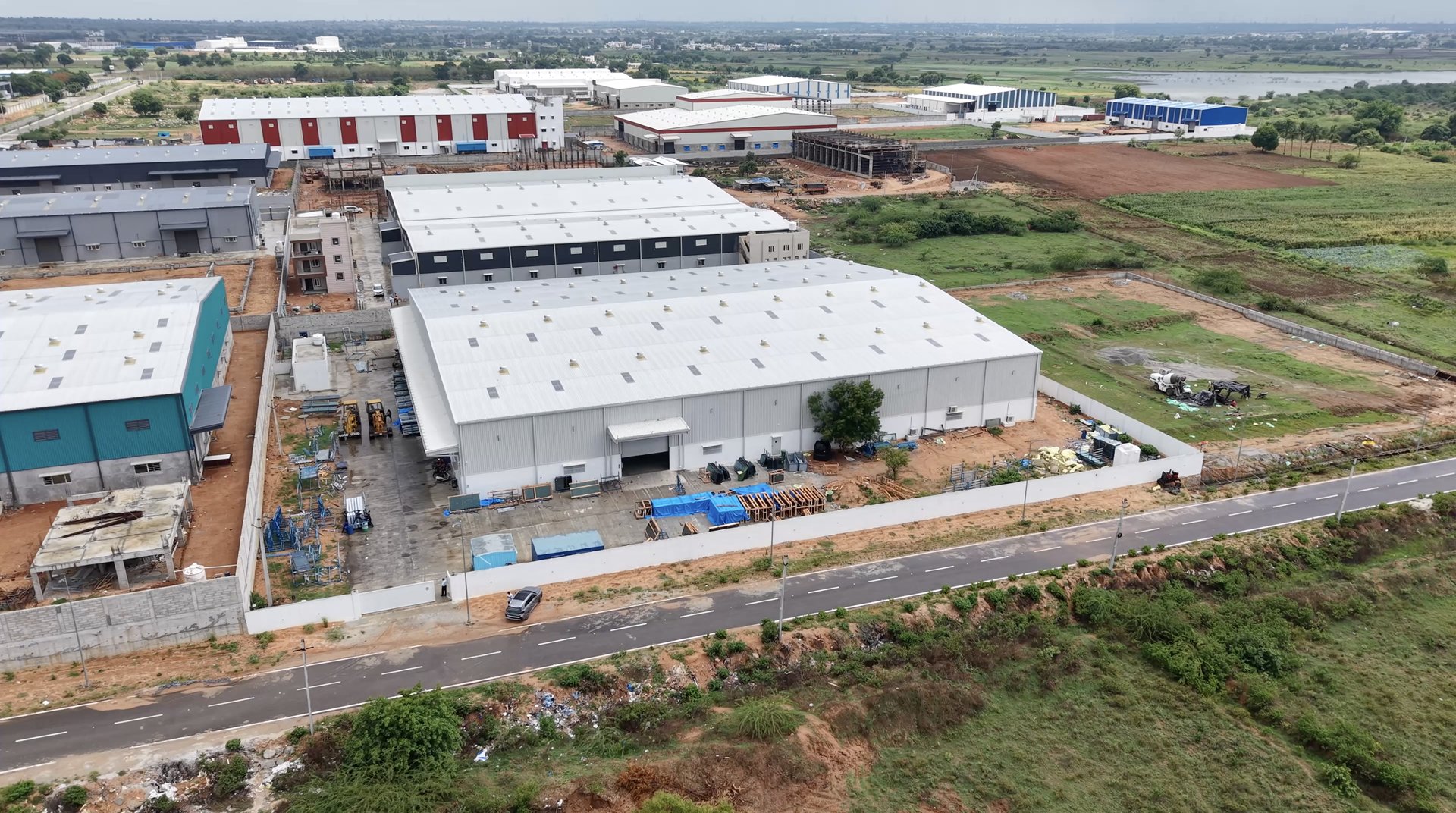 The Sun Glazing factory campus at Chandanvelly Industrial Park from the air